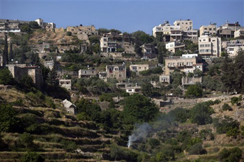 This Sunday, May 6, 2012 file photo, shows the terraced West Bank village of Battir. The United Nations cultural agency has listed the Palestinian village of Battir as a World Heritage site in danger, raising hopes among residents that this will protect their community against Israel's West Bank separation barrier. Battir, located just south of Jerusalem in the West Bank, is known for its ancient farming terraces and an irrigation system from Roman times.