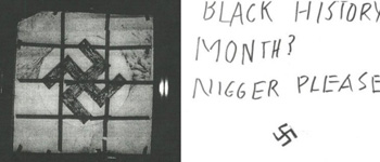 Swastika flag, note saying "Black History Month, Nigger Please"