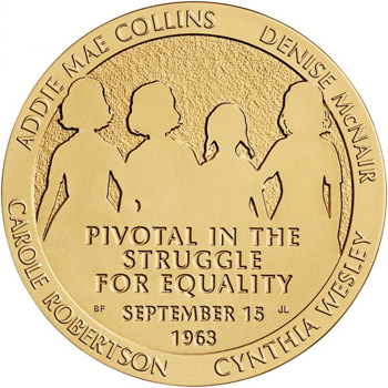 gold medal depicting the four girls killed