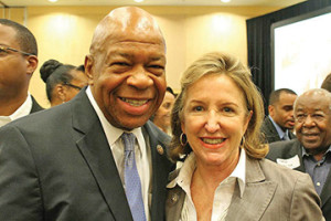 Senator Kay Hagan seen her with black Congressman Elijah Cummings of Maryland and other African Americans. Sen. Hagan is stressing the importance of protecting voting rights and promoting equality.