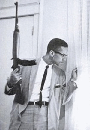 The photo of Malcolm X holding the rifle was taken when he was trying to protect his family from death threats (his home had been firebombed).