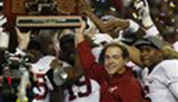 Alabama head coach Nick Saban and players celebrate after the second half of the Southeastern Conference championship NCAA college football game against Missouri, Saturday, Dec. 6, 2014, in Atlanta. Alabama won 42-13.