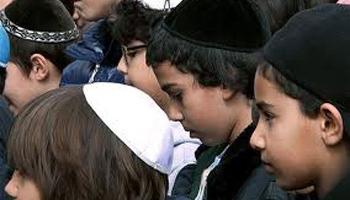 Dozens of Jewish children have been traumatized by a gang of teenagers who stormed a school bus in Sydney, Australia and allegedly hurled racial abuse and threats.