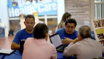 Hispanics account for about one-third of the nation's uninsured, but they seem to be staying on the sidelines as the White House races to meet a goal of 6 million sign-ups by March 31.