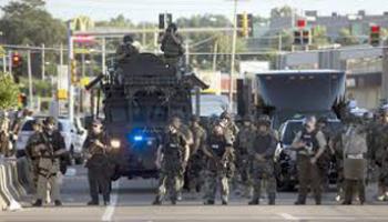Law enforcement in Ferguson, Missouri has brought out military gear to control the protest that is occurring as a result of the death of the unarmed teen, Michael Brown.