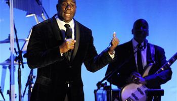 In this Oct. 11, 2014, file photo, Earvin "Magic" Johnson addresses the audience after receiving the Brass Ring Award for his humanitarian efforts at the 2014 Carousel of Hope Ball at the Beverly Hilton Hotel in Beverly Hills, Calif. Now, as an entrepreneur focused on minority markets, he says he is ready to help Silicon Valley hire more blacks and Latinos to diversify the technology industry's largely white and Asian workforce.