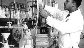 Percy Lavon Julian working in a lab