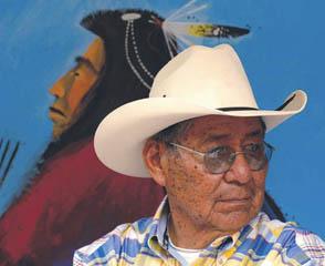 Native American man wearing cowboy hat